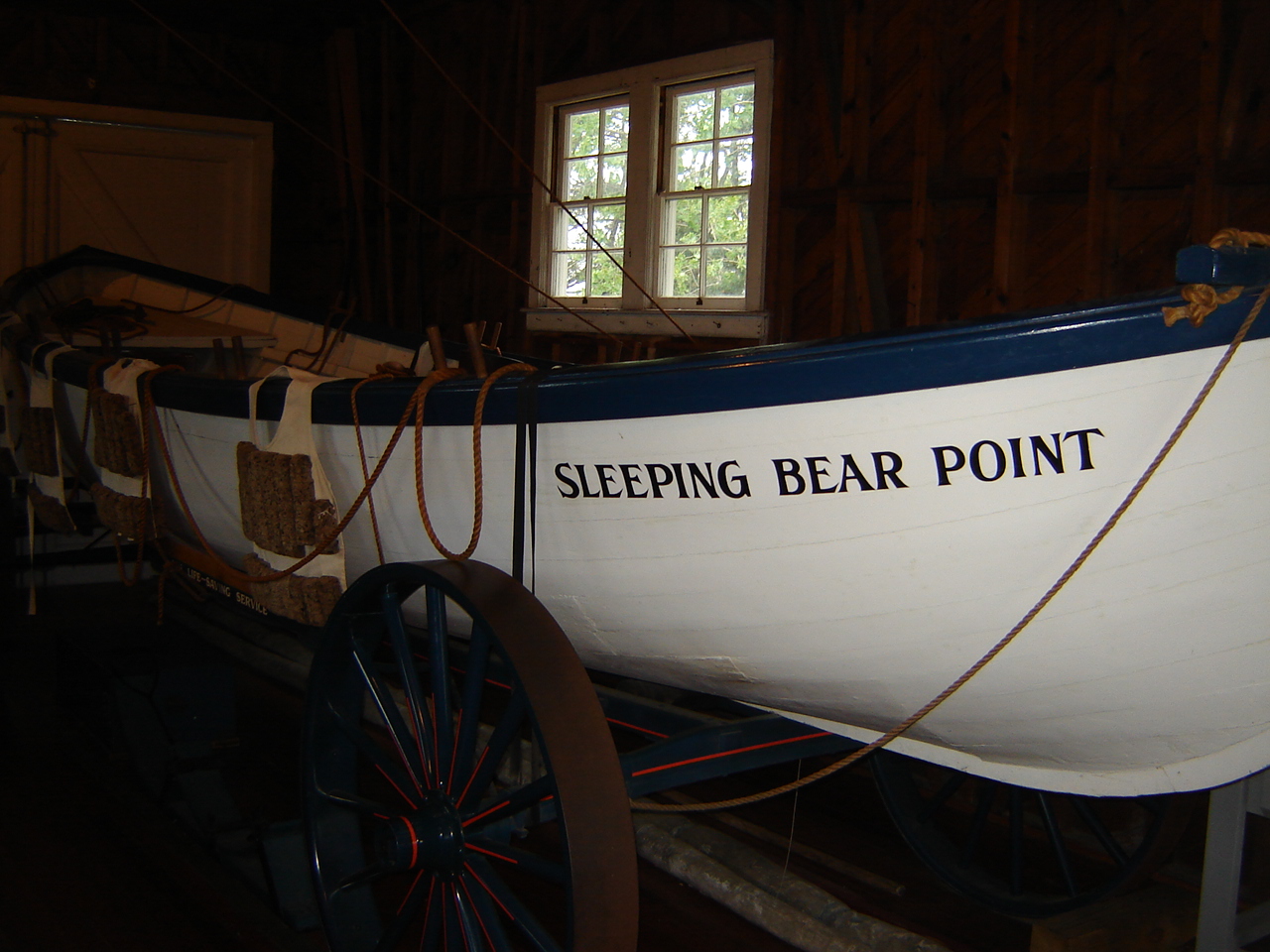A lifeboat on display at the Sleeping Bear Point Coastguard Station